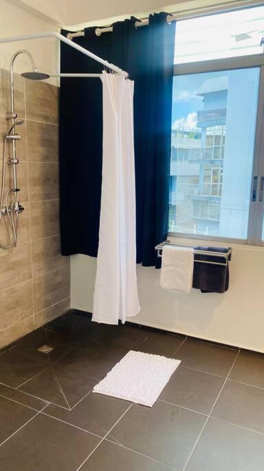 Urban Zen Appart Spacieux Studio Atypique Avec Bain A Remous Proche De Tout ปวงต์-ตา-ปิตร์ ภายนอก รูปภาพ